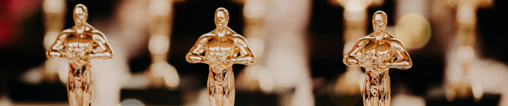estatuetas do oscar representando crescimento e estrutura no e-commerce